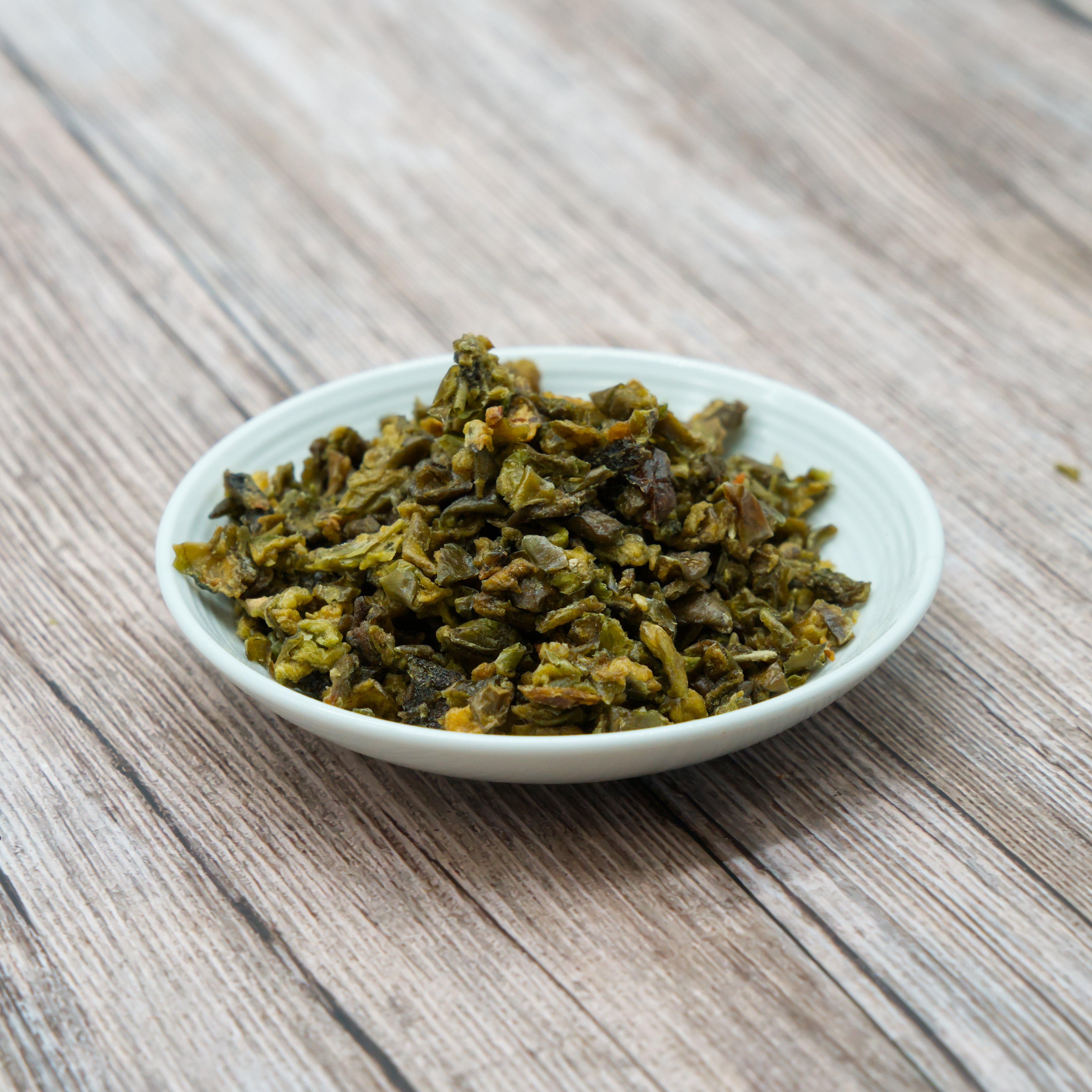 paprika-gruen-einzelfutter-fuer-voegel-koernerbude Paprikaflocken, grün getrocknet